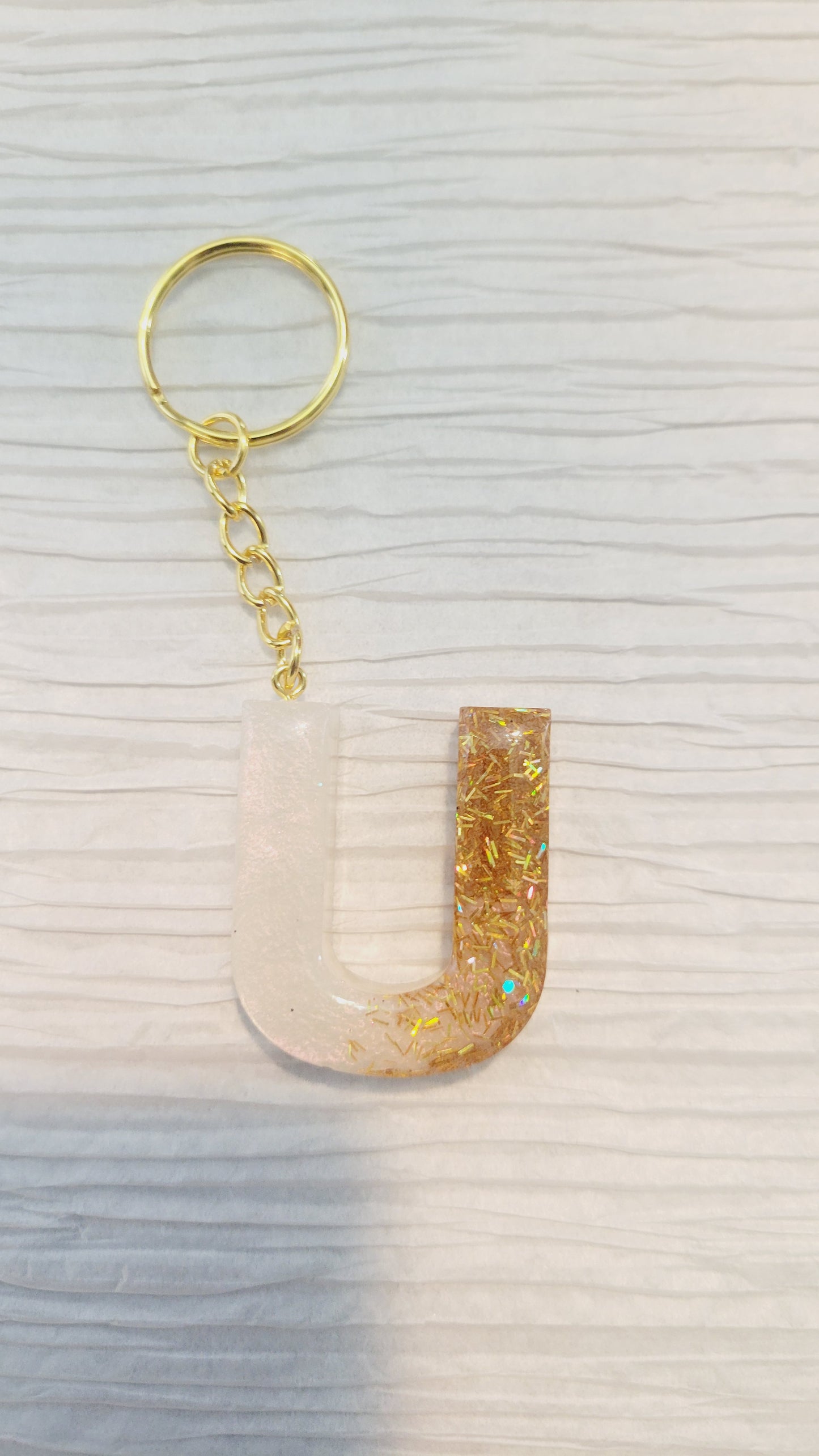 Iridescent white and gold strand letter Keychain